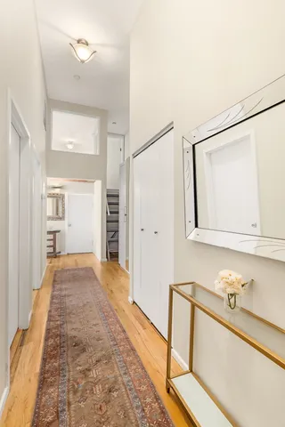 a view of a bedroom from a hallway