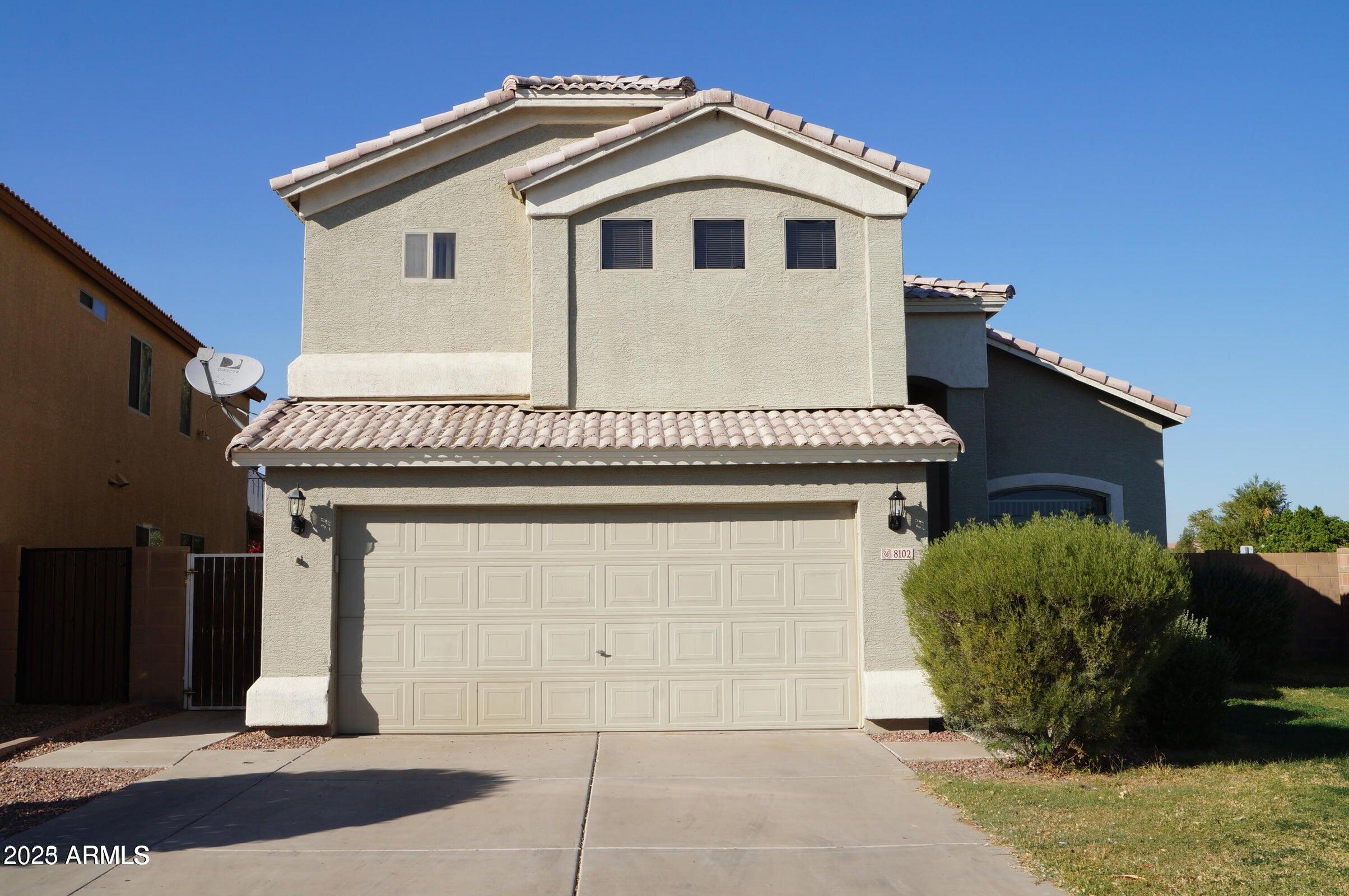 8102 West Hammond Lane Phoenix, AZ 85043 - Photo 1 of 16 a front view of a house