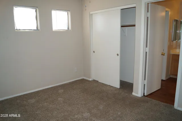 an empty room with windows