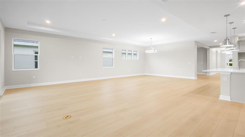 1620 Bellagio Loop Tavares, FL 32778 - Photo 11 of 81 an empty room with a empty space and windows