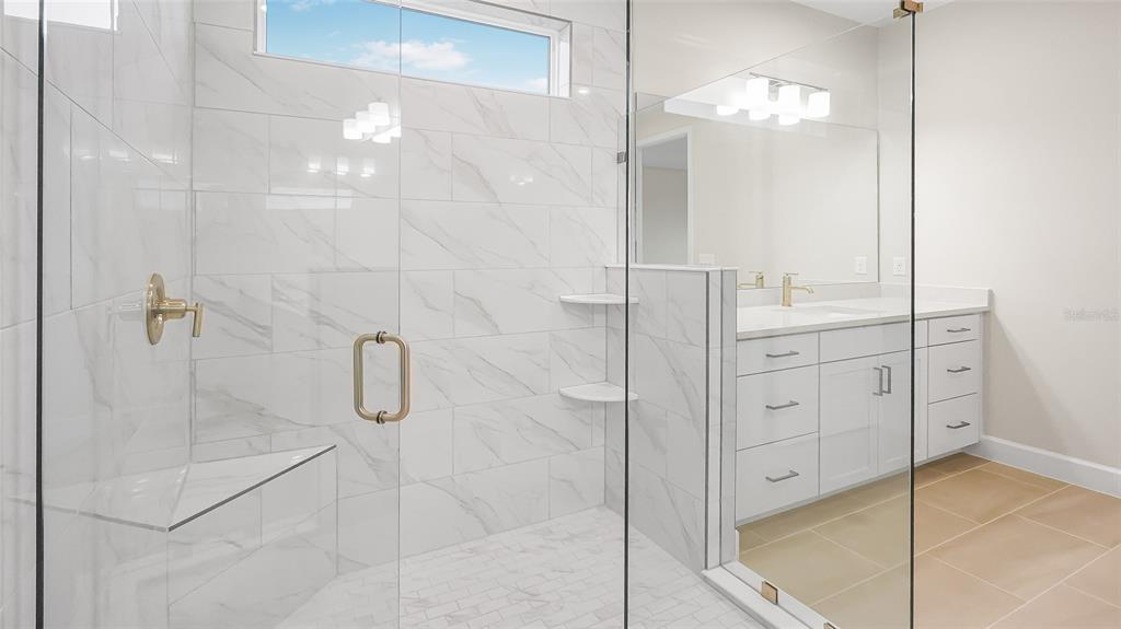 1620 Bellagio Loop Tavares, FL 32778 - Photo 46 of 81 a bathroom with a shower and a sink