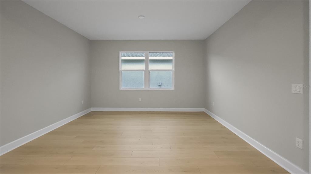 1620 Bellagio Loop Tavares, FL 32778 - Photo 50 of 81 an empty room with a window