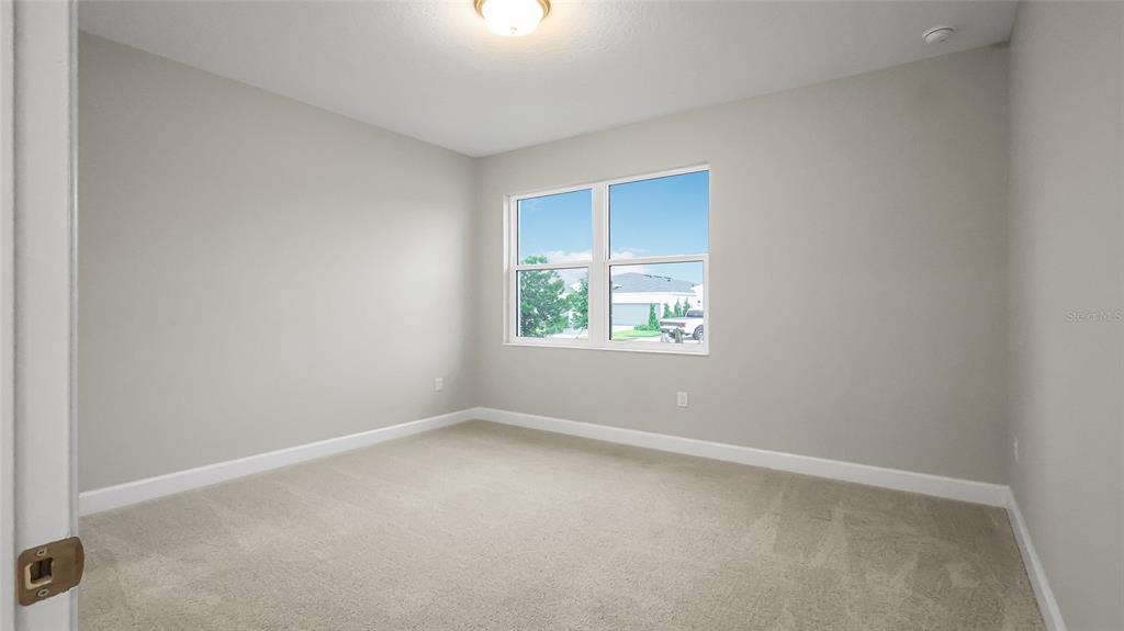 1620 Bellagio Loop Tavares, FL 32778 - Photo 55 of 81 an empty room with a window