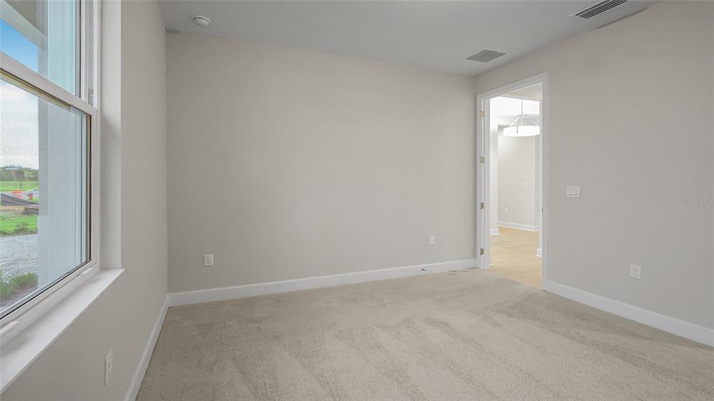 1620 Bellagio Loop Tavares, FL 32778 - Photo 59 of 81 a view of an empty room with a window