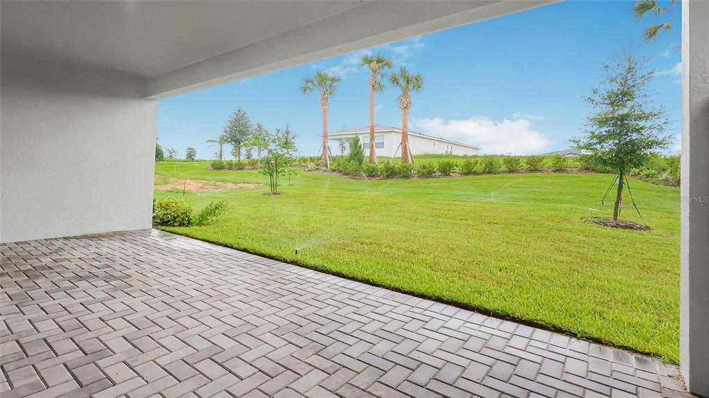 1620 Bellagio Loop Tavares, FL 32778 - Photo 67 of 81 a view of an outdoor space and a yard