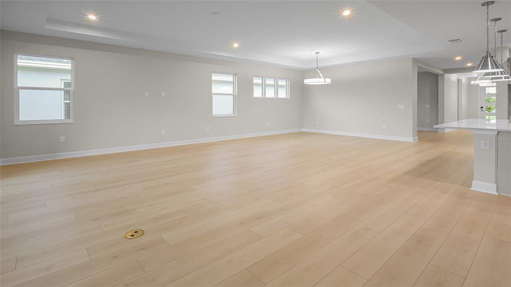 1620 Bellagio Loop Tavares, FL 32778 - Photo 10 of 81 an empty room with windows and entrance