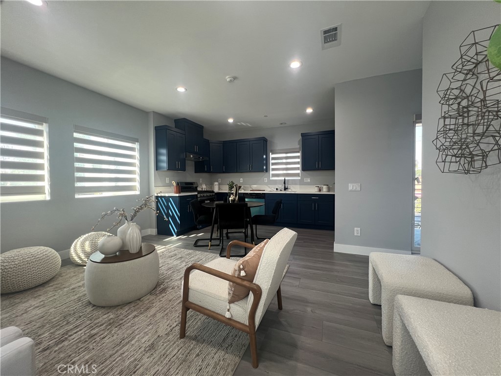 142 North Hewes Orange, CA 92869 - Photo 4 of 11 a living room with furniture and kitchen view