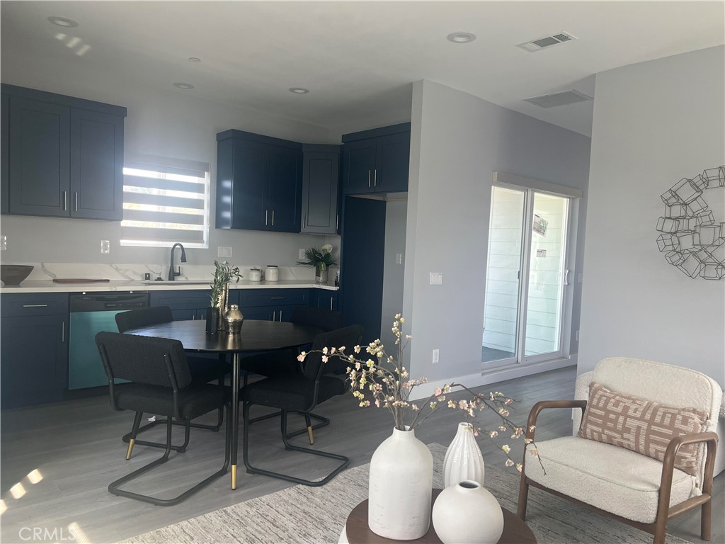 142 North Hewes Orange, CA 92869 - Photo 6 of 11 a workspace with furniture and window