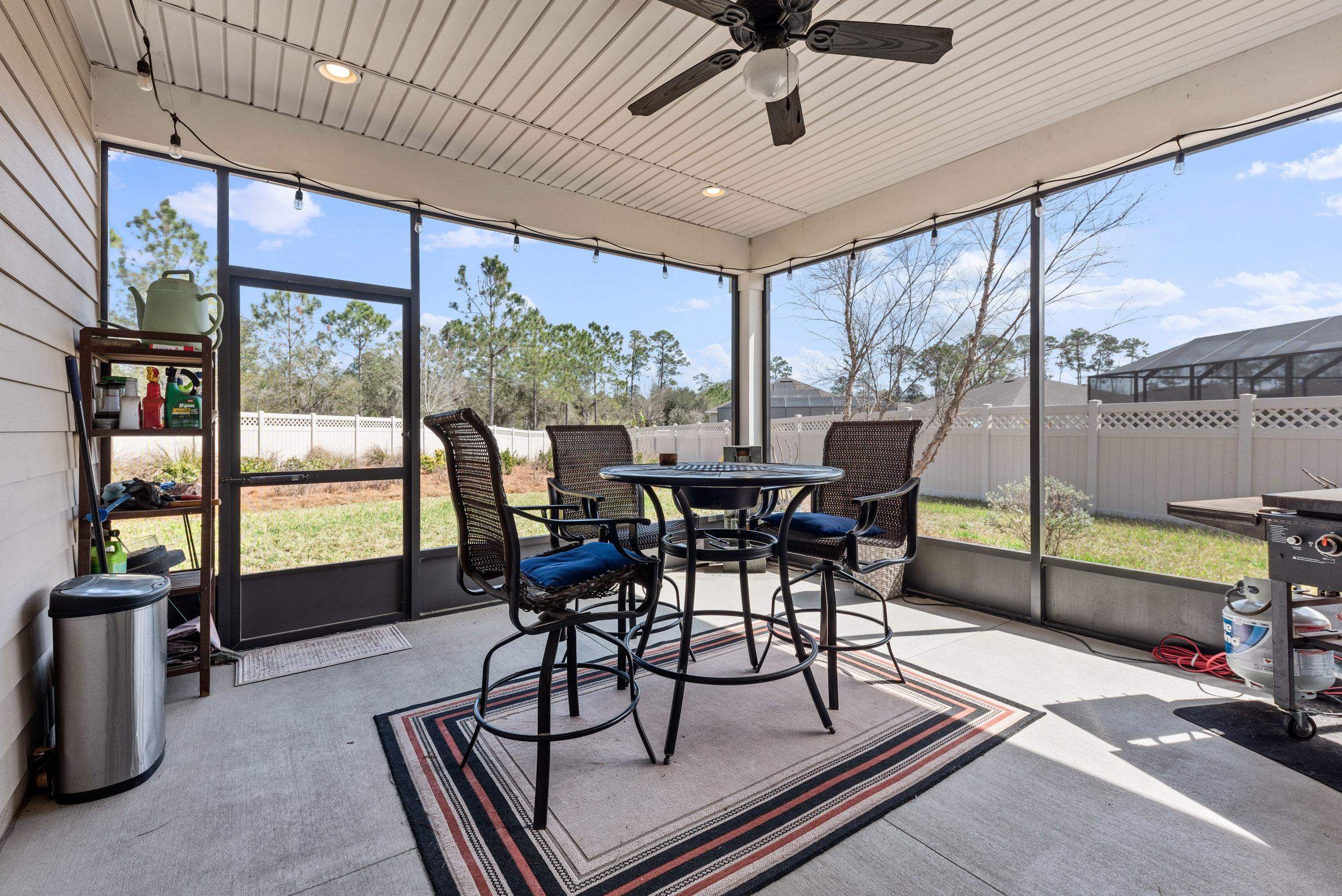55 Lansing Court St. Augustine, FL 32092 - Photo 30 of 42 a view of a dining room with furniture window and outside view