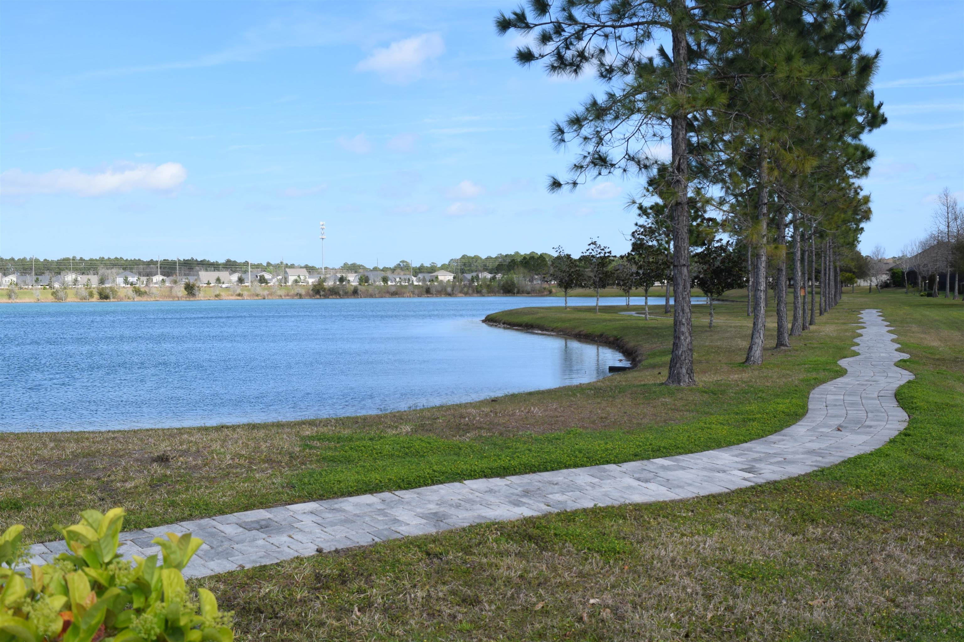 55 Lansing Court St. Augustine, FL 32092 - Photo 39 of 42 a view of a lake with a big yard