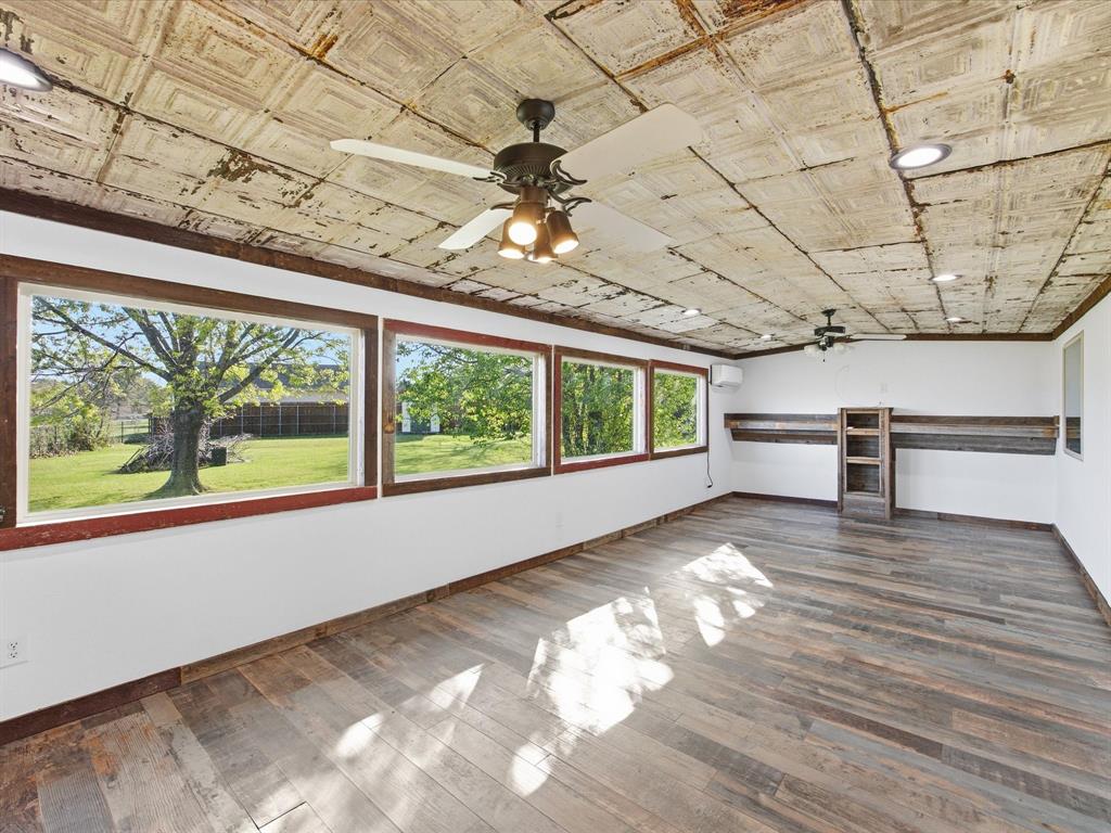 116 County Road 1559 Alba, TX 75410 - Photo 15 of 40 a view of a room with a large window