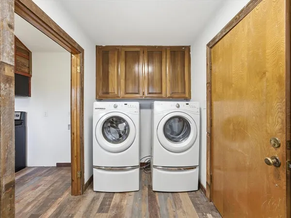 a utility room with dryer and washer