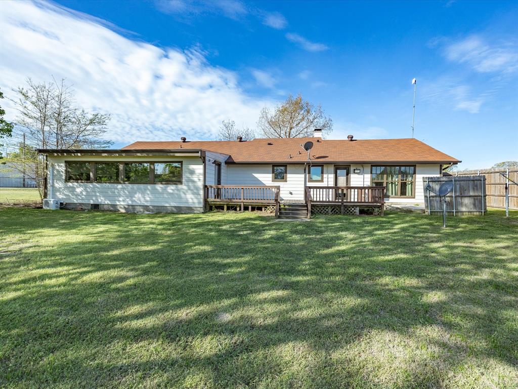 116 County Road 1559 Alba, TX 75410 - Photo 27 of 40 a front view of a house with a garden