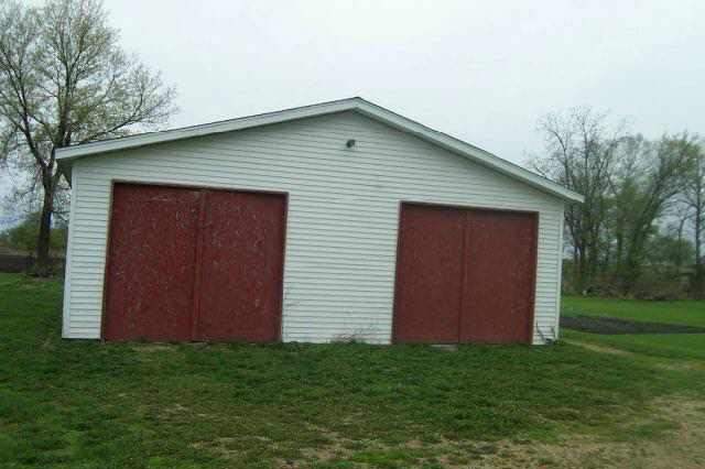 207 Washington Street Ridott, IL 61067 - Photo 5 of 8 a front view of house with yard