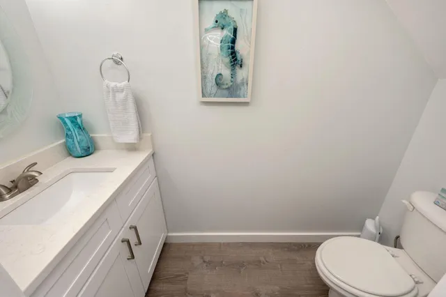 a bathroom with a sink and toilet