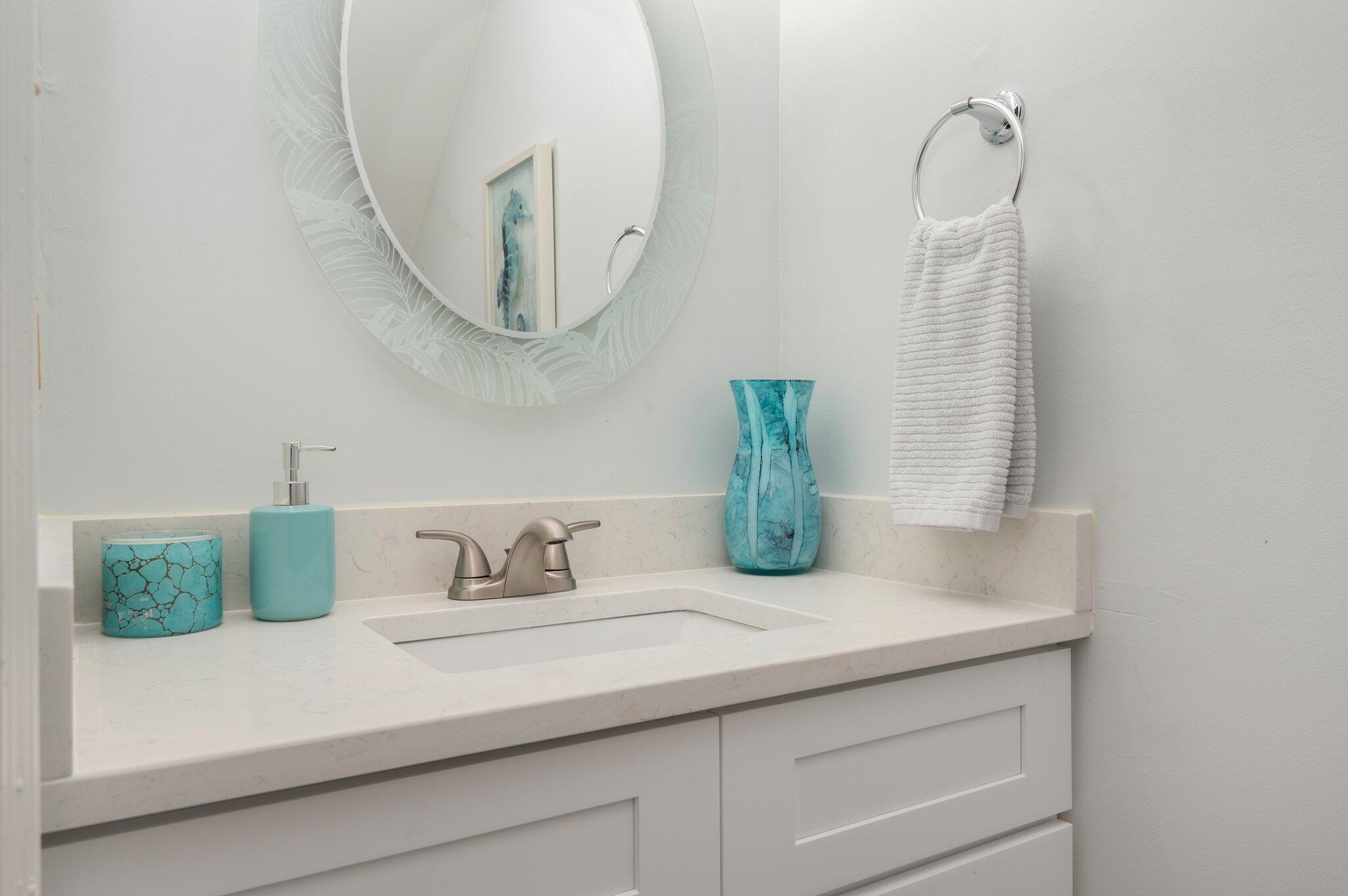 60 Sandprints Drive, Unit C6 Miramar Beach, FL 32550 - Photo 13 of 28 a bathroom with a sink and a mirror