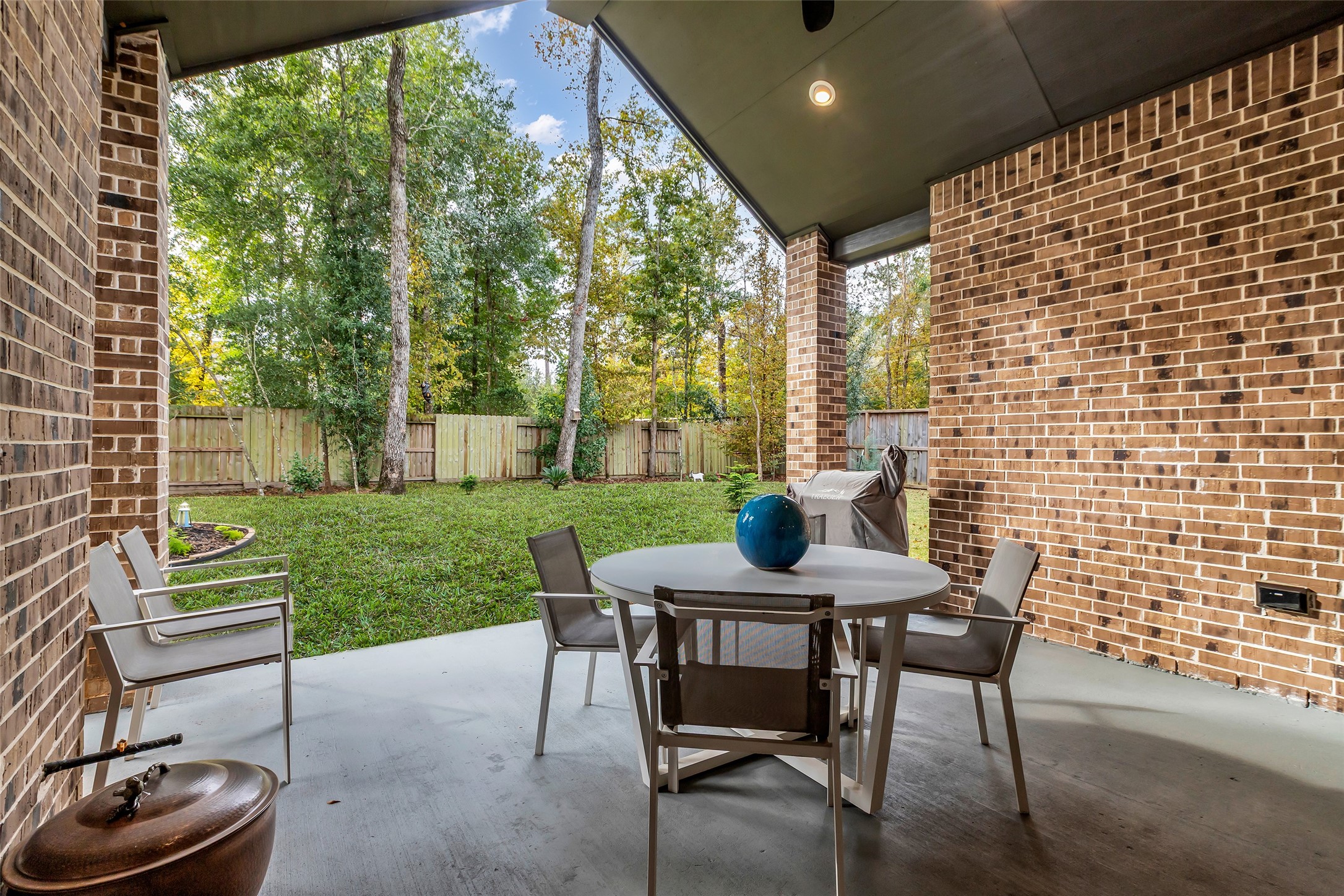 633 North Rivus Overlook Drive Willis, TX 77318 - Photo 25 of 28 a view of a patio with a yard