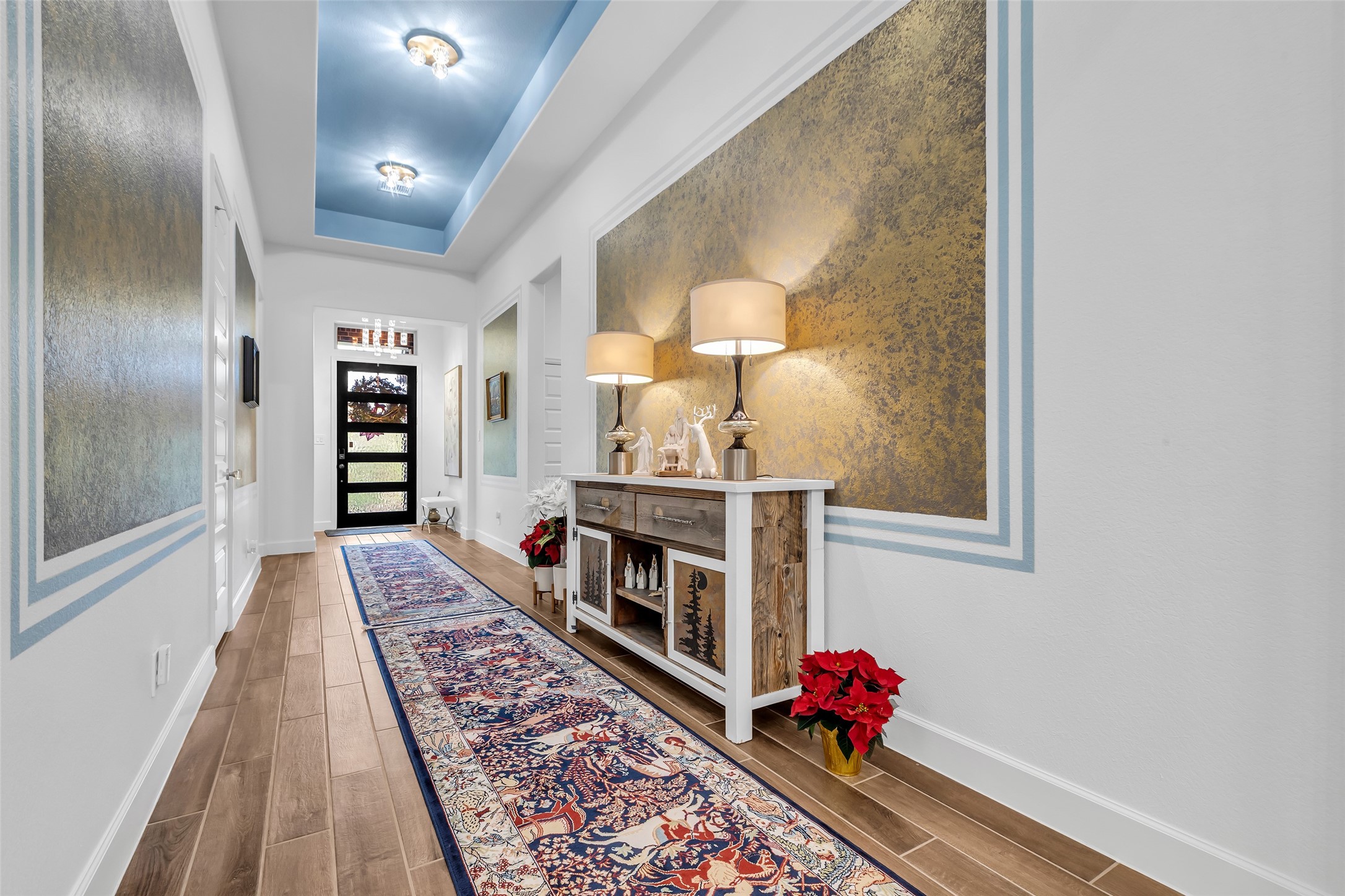 633 North Rivus Overlook Drive Willis, TX 77318 - Photo 4 of 28 a hallway with a book shelf