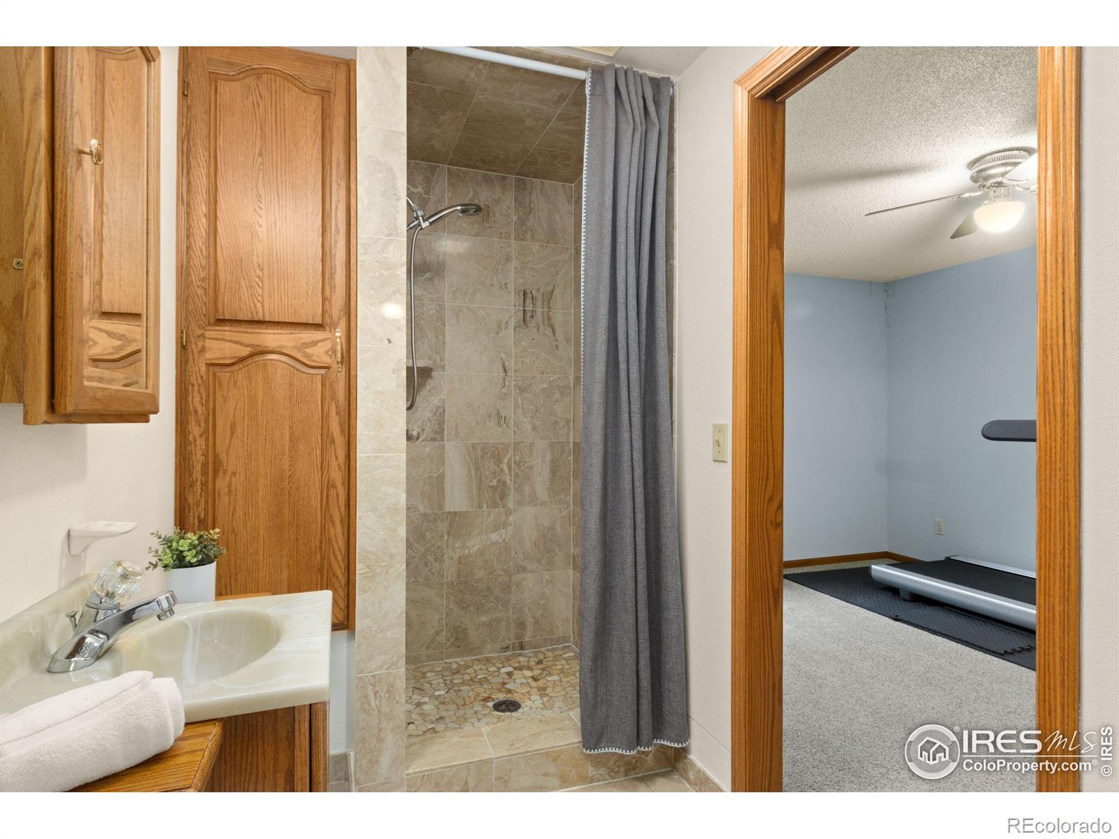 3367 Dudley Way Fort Collins, CO 80526 - Photo 20 of 29 a bathroom with a sink and a mirror