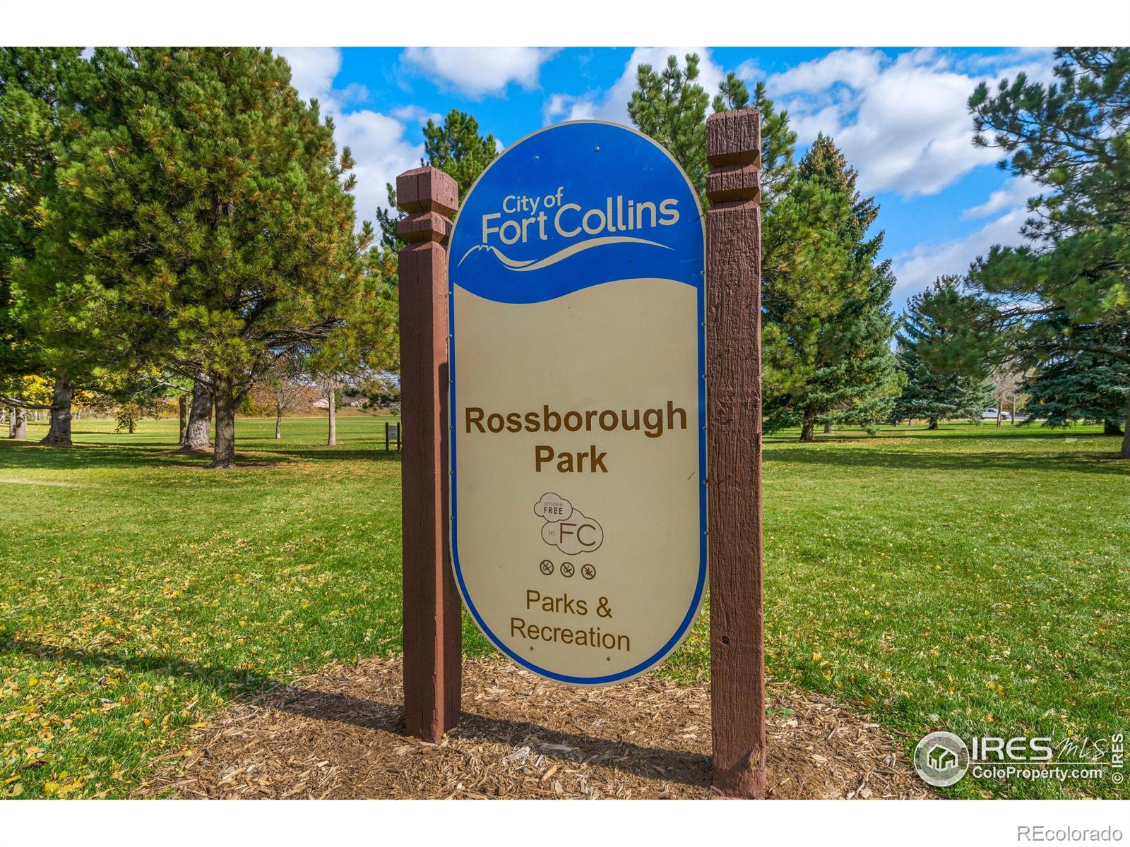 3367 Dudley Way Fort Collins, CO 80526 - Photo 26 of 29 a view of a park with welcome board