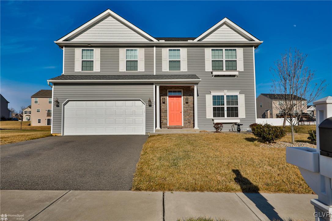 11 Krocks Road Allentown, PA 18104 - Photo 1 of 49 a front view of a house with a yard and garage