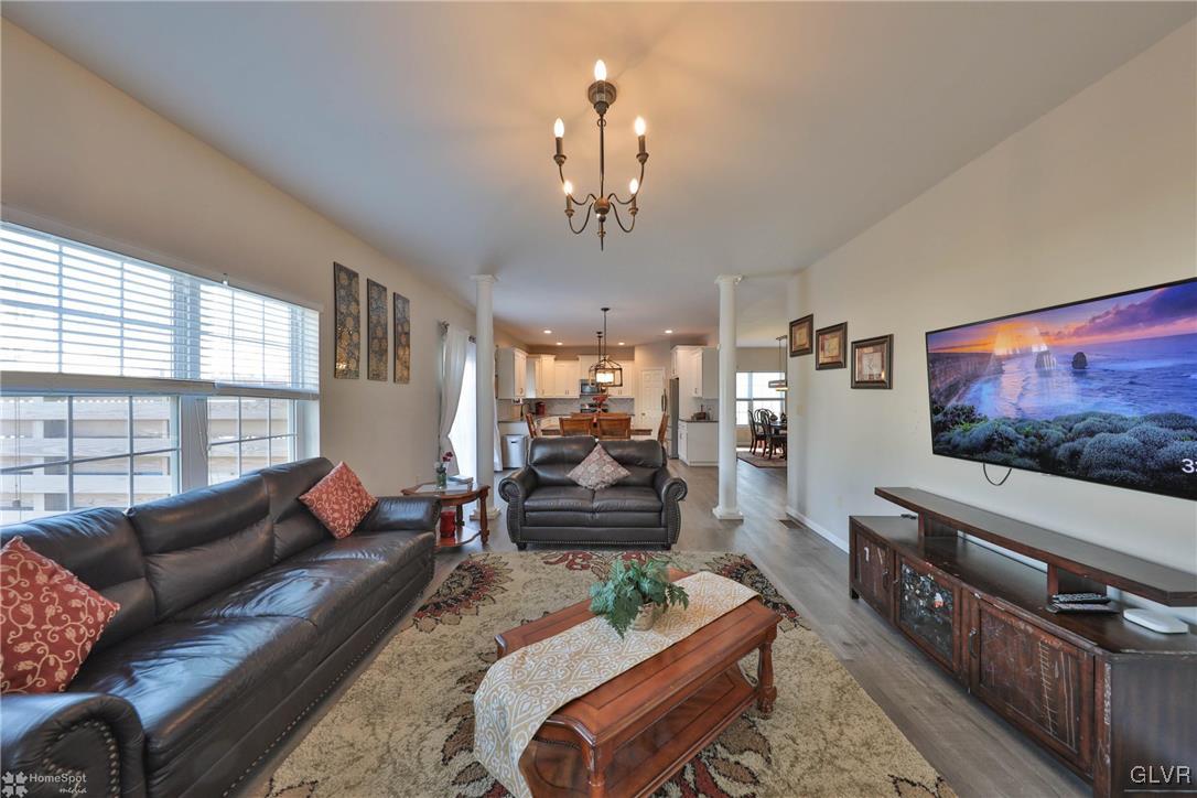 11 Krocks Road Allentown, PA 18104 - Photo 19 of 49 a living room with furniture and a flat screen tv