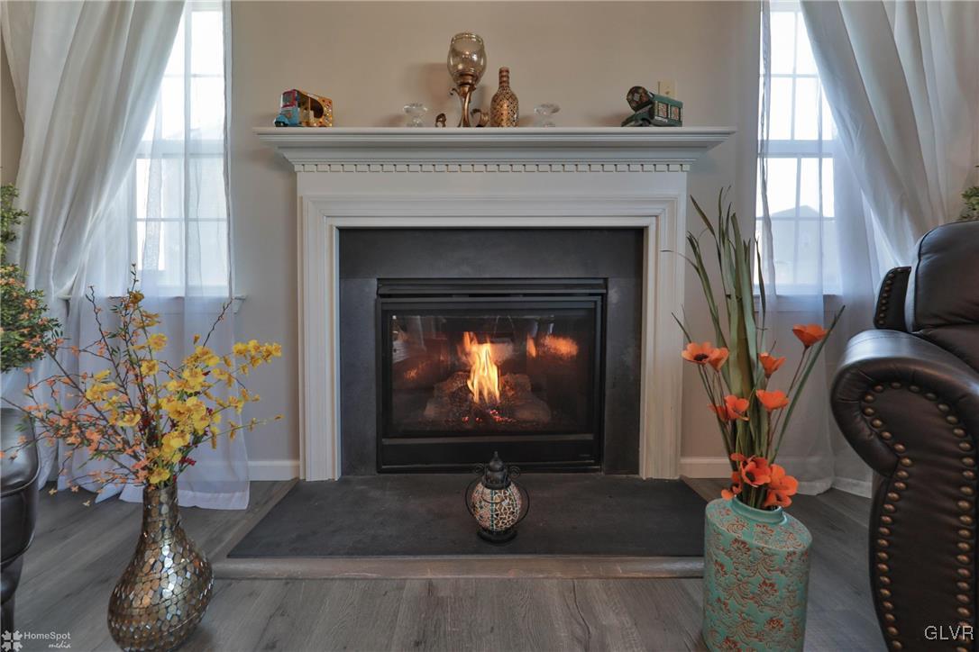 11 Krocks Road Allentown, PA 18104 - Photo 21 of 49 a living room with painting on the wall and a window