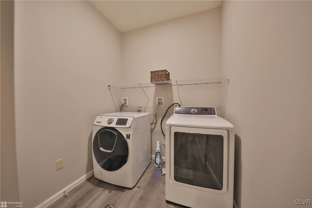 11 Krocks Road Allentown, PA 18104 - Photo 22 of 49 a utility room with dryer and washer