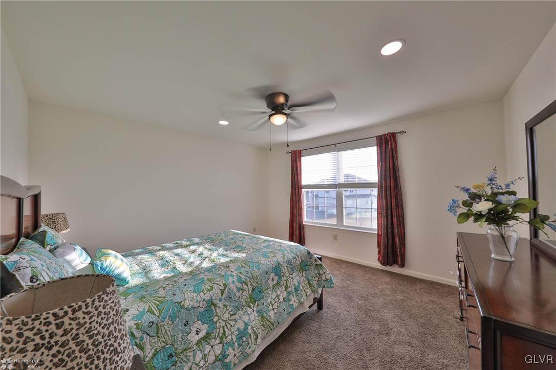 11 Krocks Road Allentown, PA 18104 - Photo 25 of 49 a bedroom with a bed and a potted plant