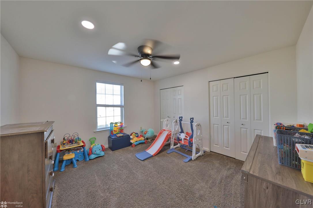 11 Krocks Road Allentown, PA 18104 - Photo 27 of 49 a living room with furniture and a flat screen tv