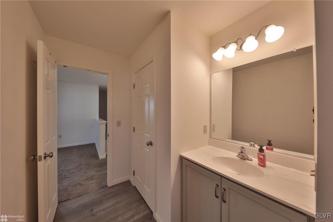 11 Krocks Road Allentown, PA 18104 - Photo 29 of 49 a bathroom with a sink and a mirror