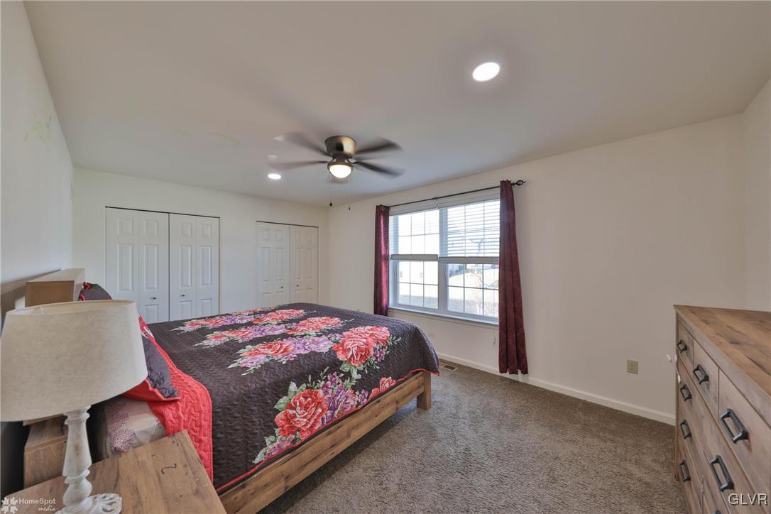 11 Krocks Road Allentown, PA 18104 - Photo 30 of 49 a bedroom with a bed and a lamp