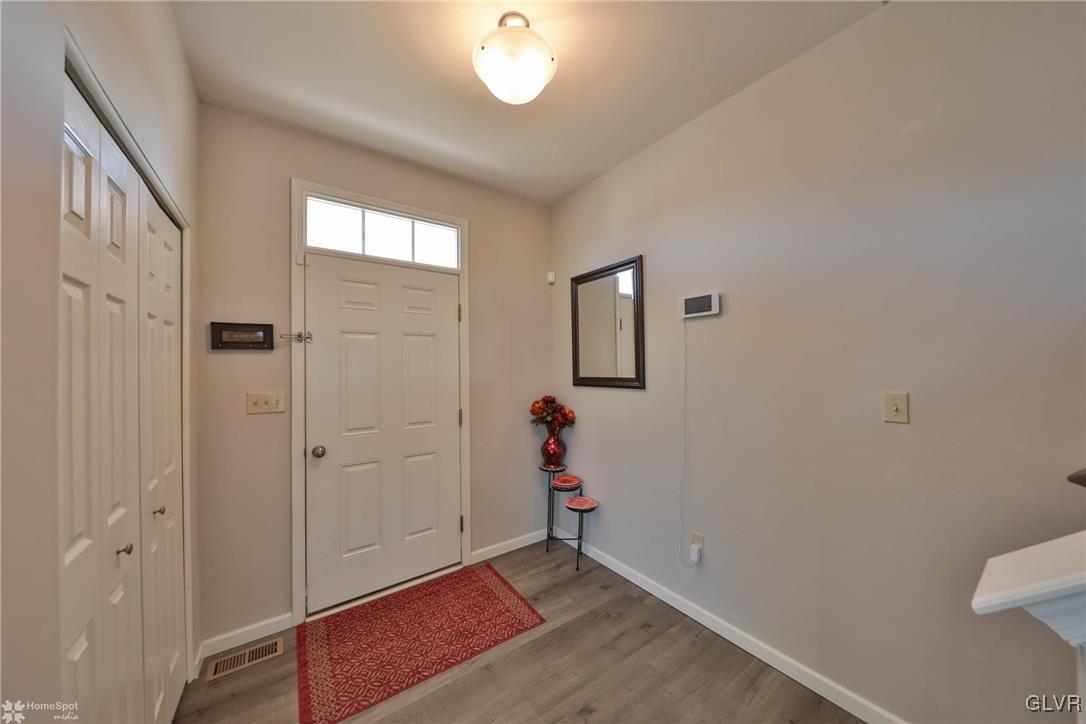 11 Krocks Road Allentown, PA 18104 - Photo 3 of 49 wooden floor in an empty room with a window