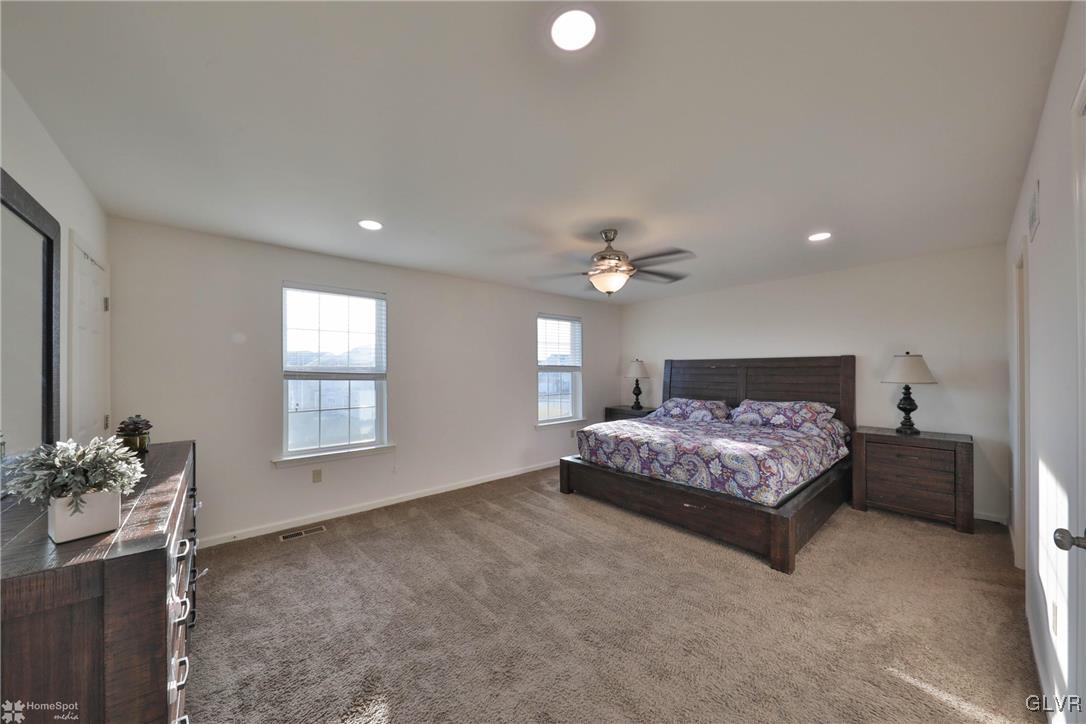 11 Krocks Road Allentown, PA 18104 - Photo 32 of 49 a bedroom with a bed mirror and window