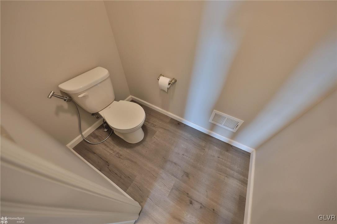 11 Krocks Road Allentown, PA 18104 - Photo 35 of 49 a white toilet sitting next to a bathroom sink