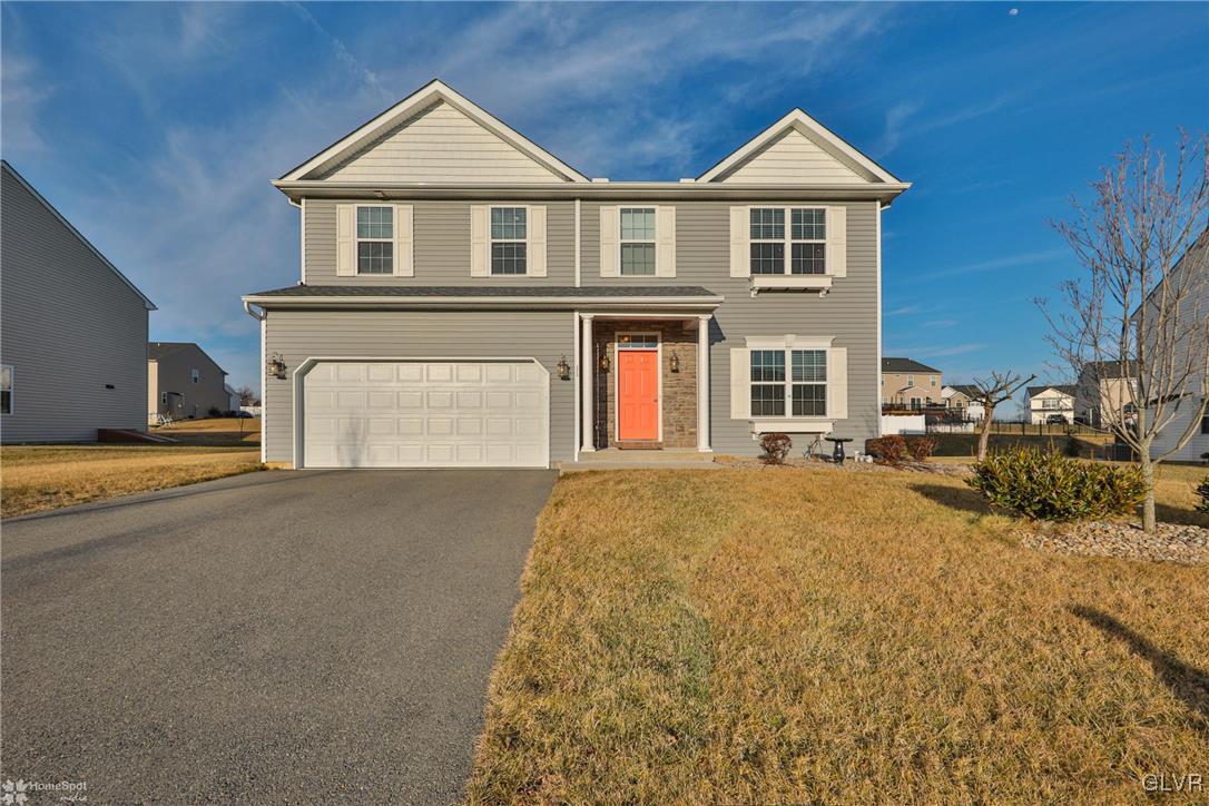 11 Krocks Road Allentown, PA 18104 - Photo 5 of 49 a front view of a house with a yard and garage