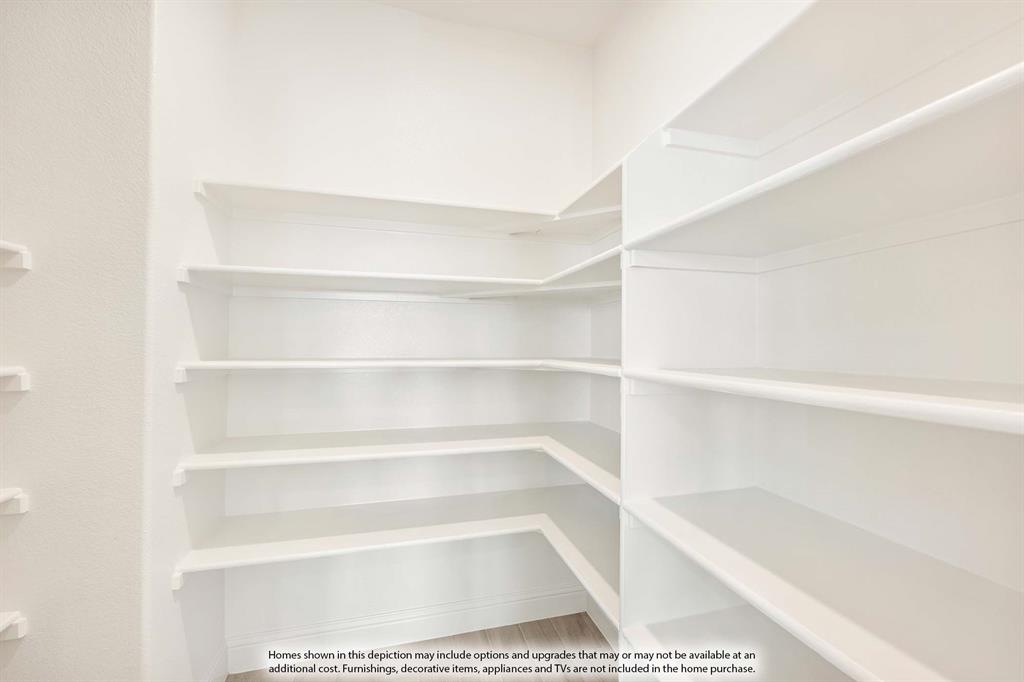 2014 Dundalk Lane Forney, TX 75126 - Photo 15 of 38 a view of a walk in closet with empty racks