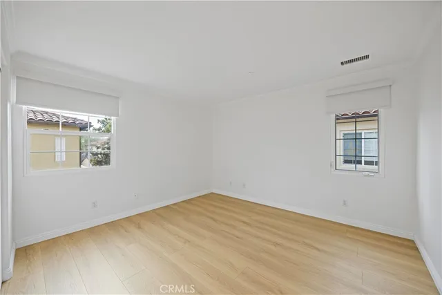 a view of a room that has a window in it