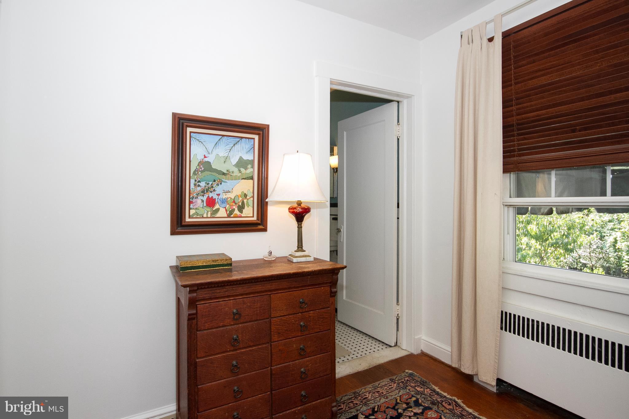 601 Dunkirk Road Baltimore, MD 21212 - Photo 13 of 22 a room that has a dresser in it