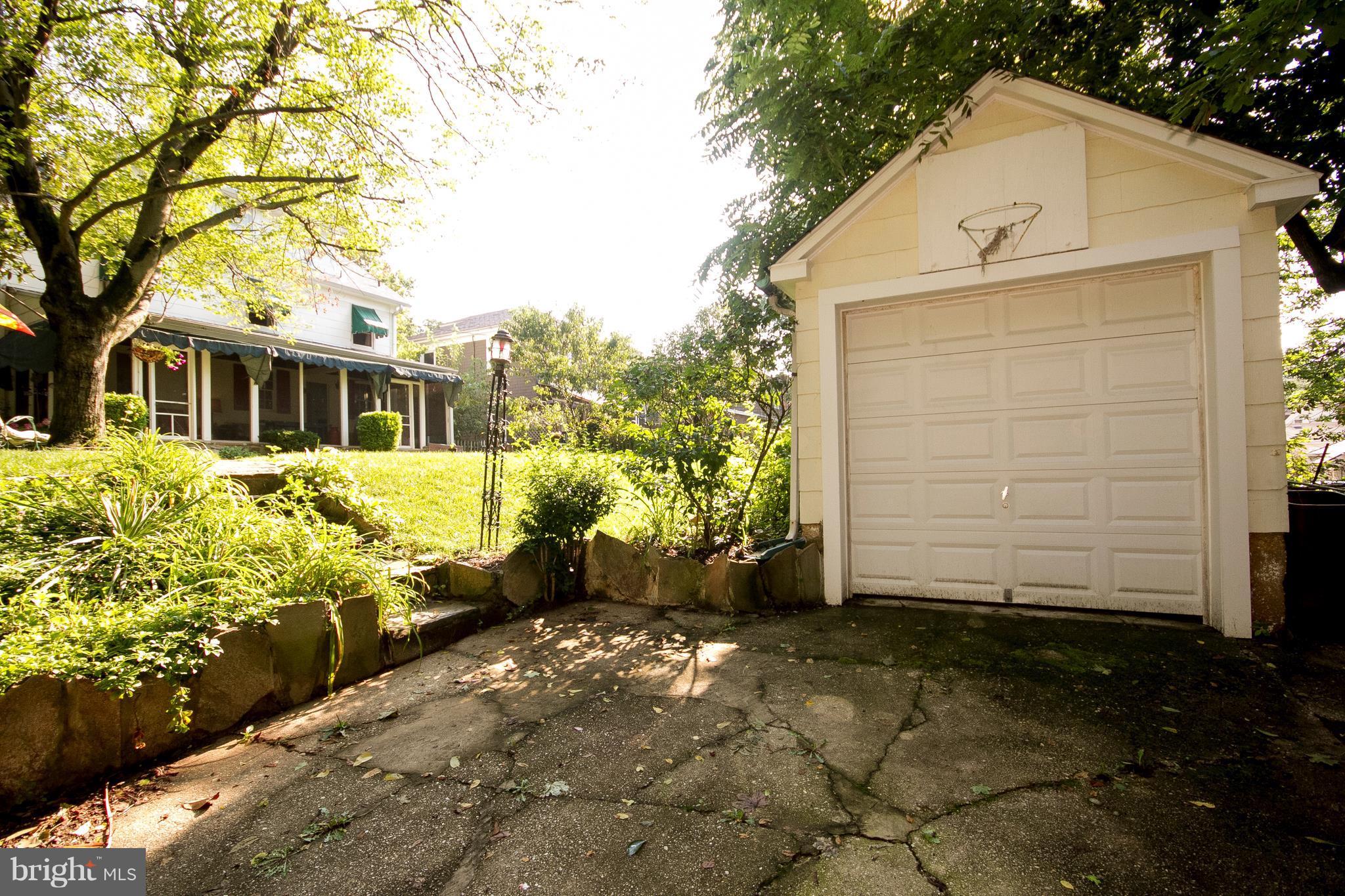 601 Dunkirk Road Baltimore, MD 21212 - Photo 21 of 22 a front view of a house with a yard