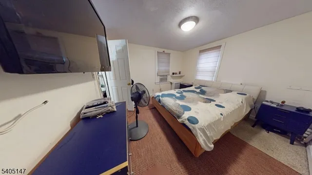 a room with furniture and a window