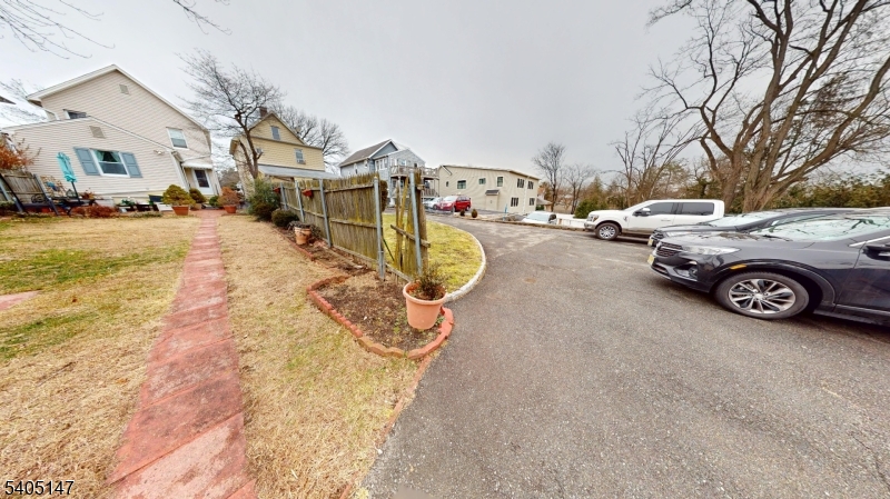 96 Rector Street Millburn, NJ 07041 - Photo 7 of 30 a view of a city street with cars