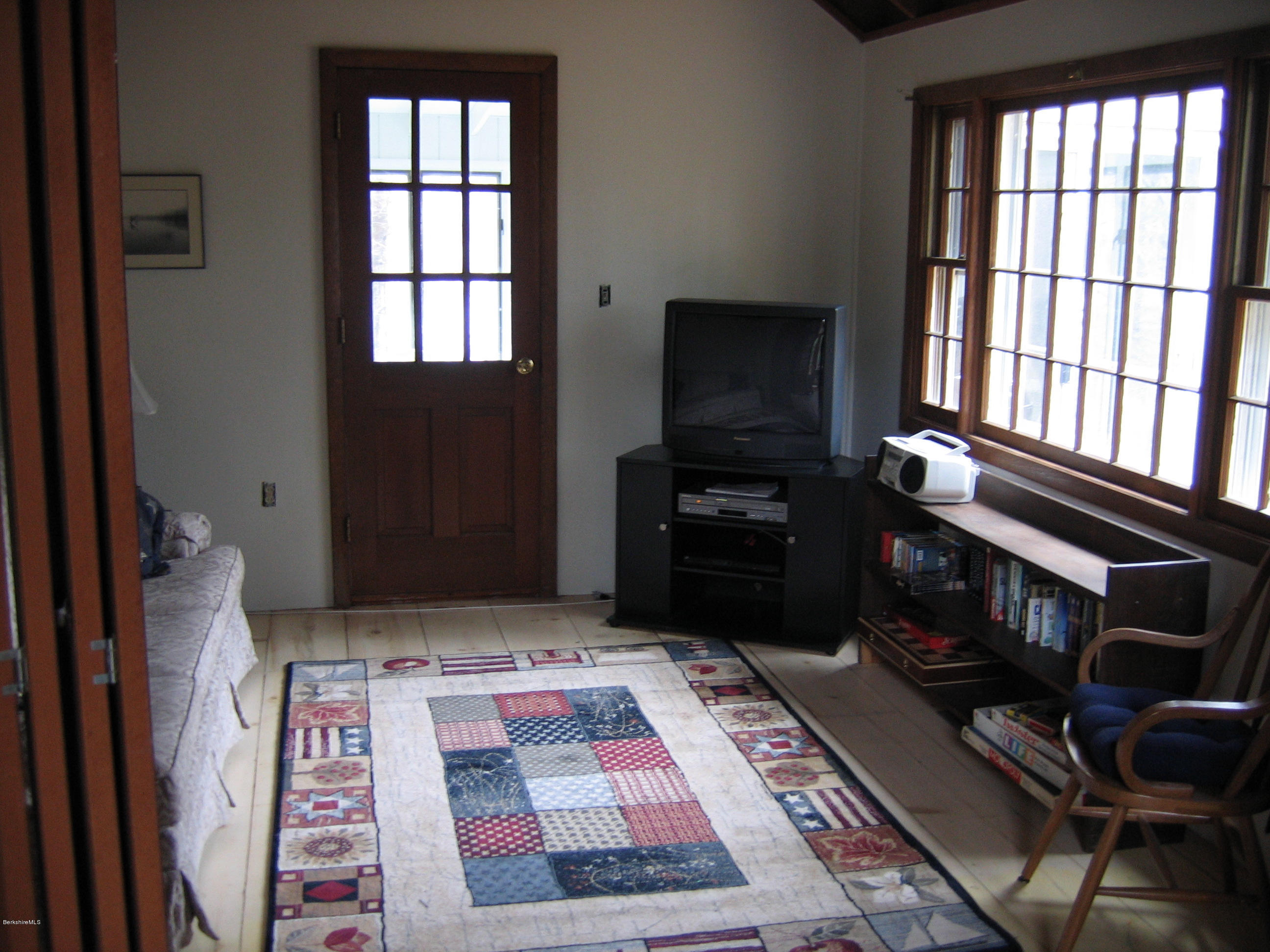 25 Sylvan Road Monterey, MA 01245 - Photo 6 of 17 a bedroom with furniture and a window