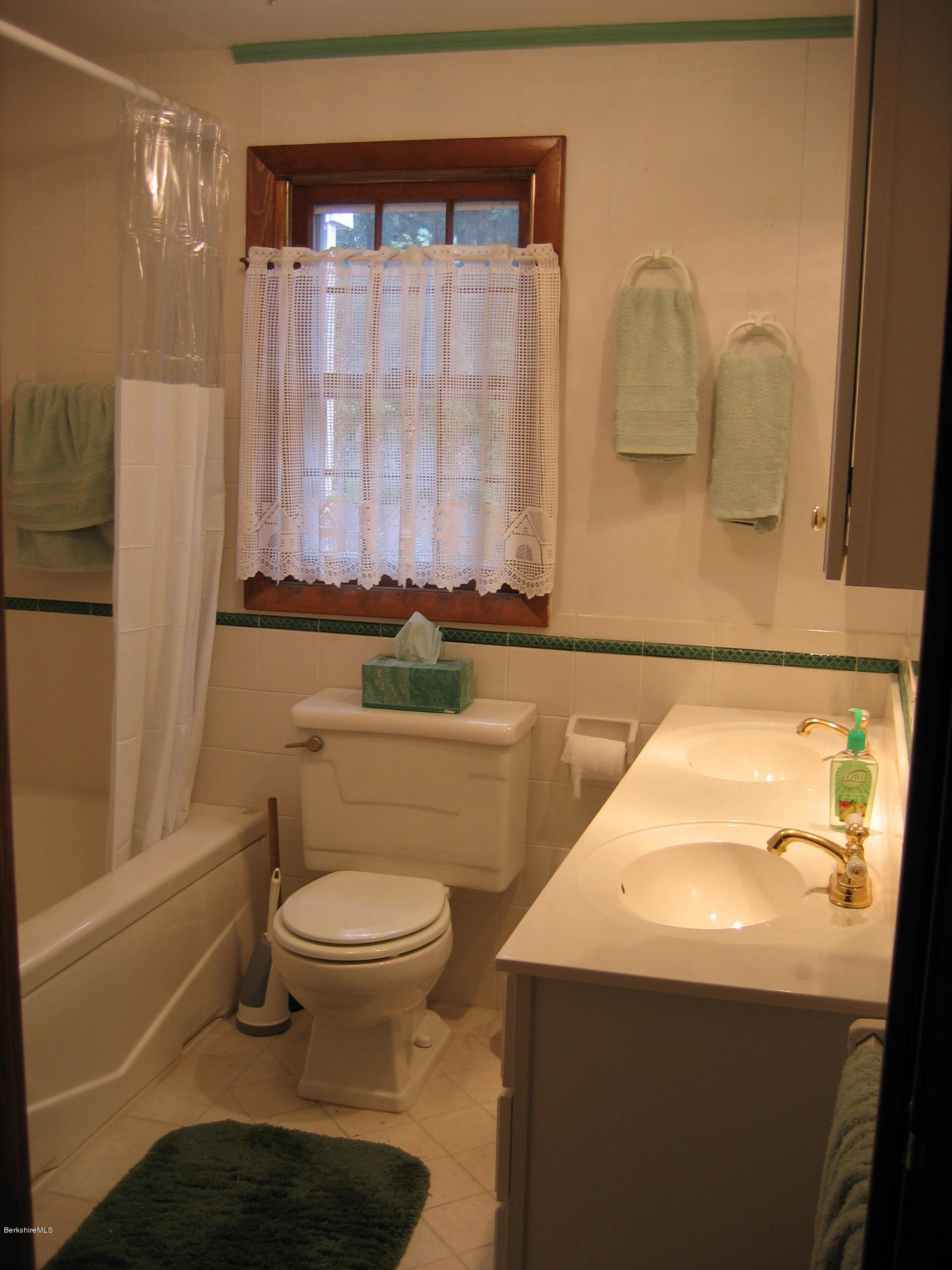 25 Sylvan Road Monterey, MA 01245 - Photo 9 of 17 a bathroom with a sink a toilet and shower
