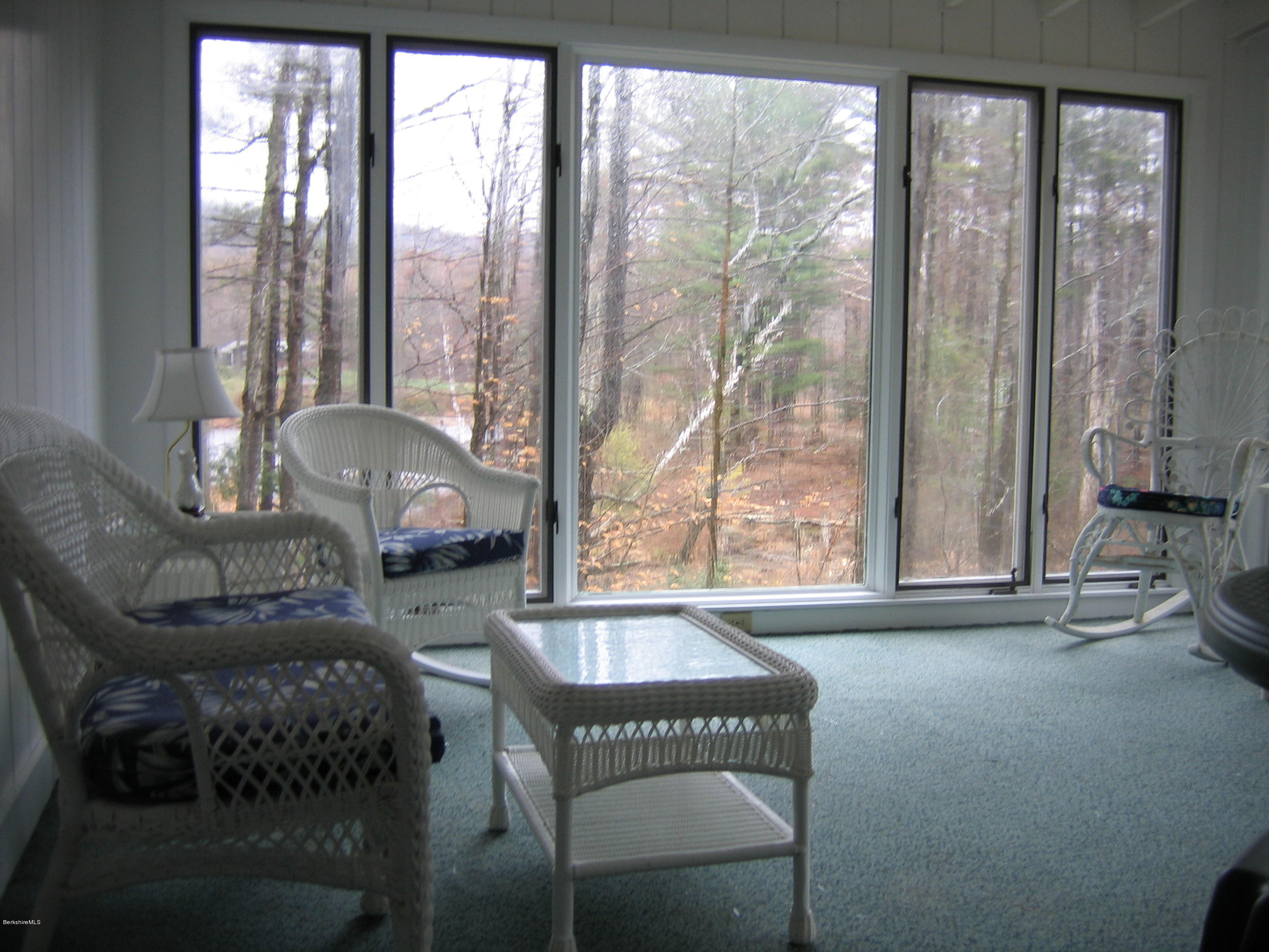 25 Sylvan Road Monterey, MA 01245 - Photo 10 of 17 a living room with furniture and a floor to ceiling window