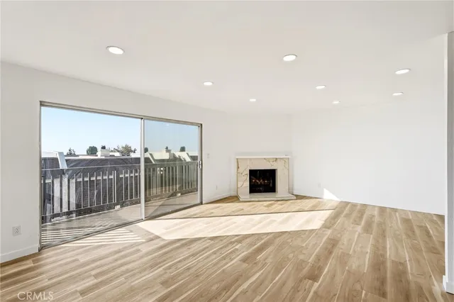 a view of outdoor space with wooden floor