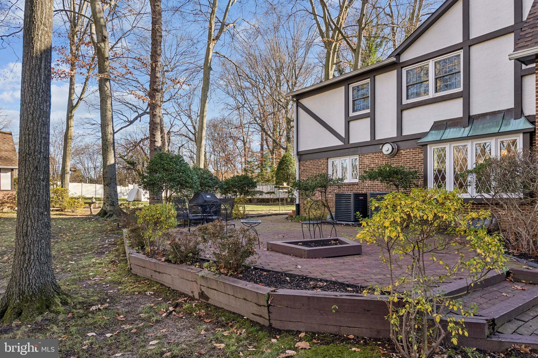 2 Oriole Way Moorestown, NJ 08057 - Photo 26 of 28 a view of a yard with plants and trees