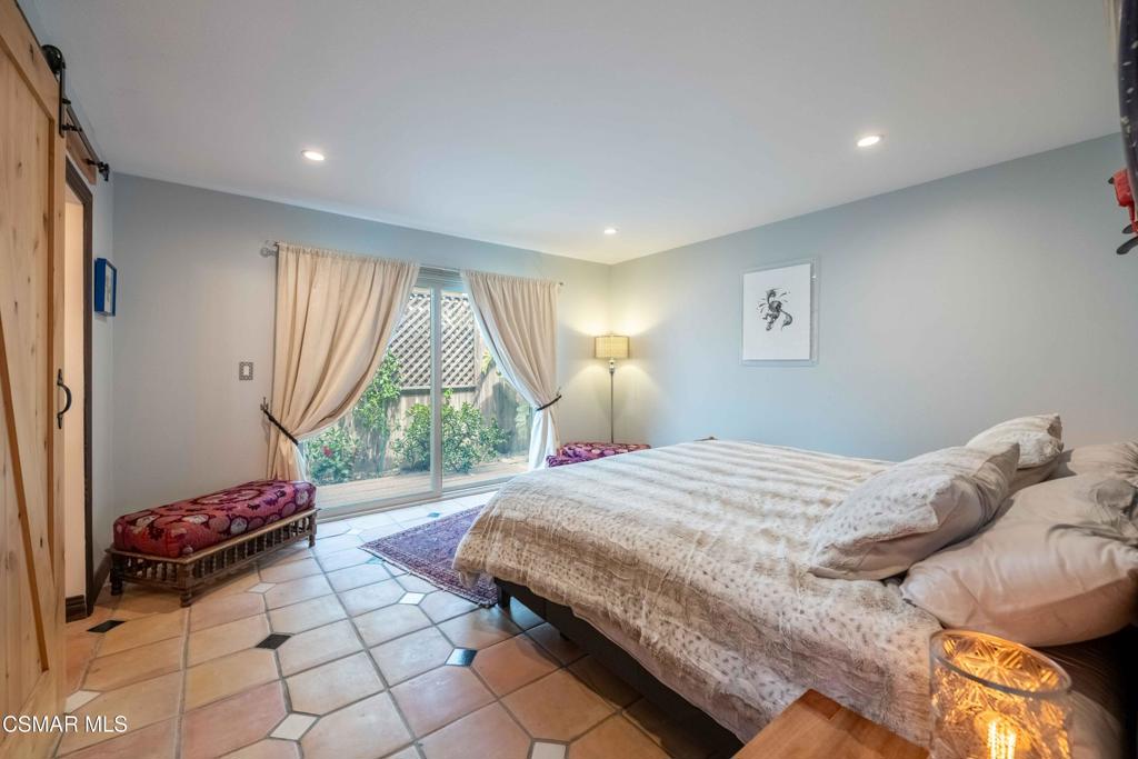 5121 Breakwater Way Oxnard, CA 93035 - Photo 22 of 54 a bedroom with a bed and a window