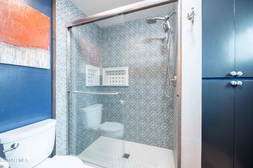 5121 Breakwater Way Oxnard, CA 93035 - Photo 28 of 54 a white toilet sitting next to a bathroom sink