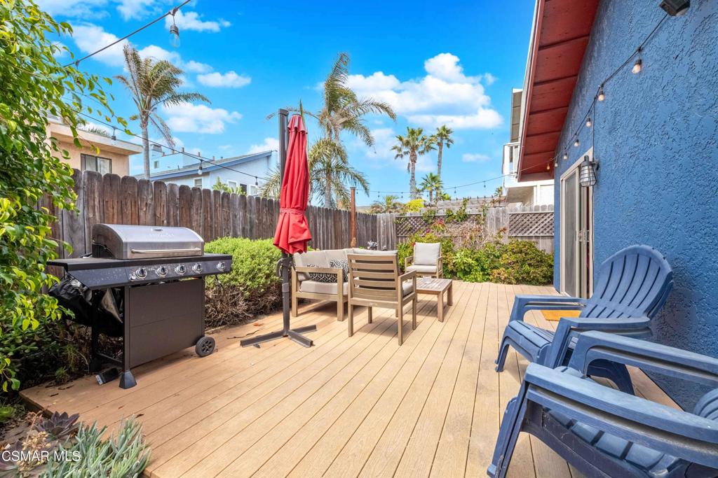 5121 Breakwater Way Oxnard, CA 93035 - Photo 37 of 54 a view of a chairs and table in the patio